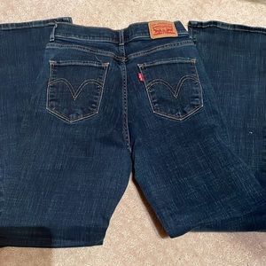 Levi’s, size 4M, size 27/32, boot cut, blue jeans.